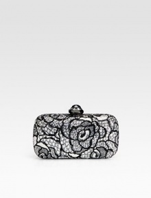 A sophisticated crystal encrusted design that is meticulously hand-crafted to perfection.Detachable chain shoulder strap, 9 dropPush-lock closureMetallic leather lining5¾W X 3½H X 1¼DMade in Italy A sophisticated crystal encrusted design that is meticulously hand-crafted to perfection.Detachable chain shoulder strap, 9 dropPush-lock closureMetallic leather lining5¾W X 3½H X 1¼DMade in Italy