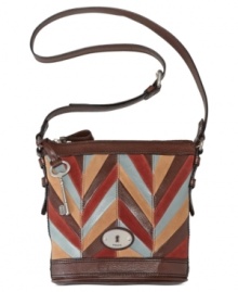 Punch up your everyday ensemble with pretty patchwork, like with this go-anywhere design by Fossil. Crafted from supple leather with shabby-chic hardware, its versatile crossbody strap keeps hands free for hailing a cab while holding a cup of morning Joe. Punch up your everyday ensemble with pretty patchwork, like with this go-anywhere design by Fossil. Crafted from supple leather with shabby-chic hardware, its versatile crossbody strap keeps hands free for hailing a cab while holding a cup of morning Joe.
