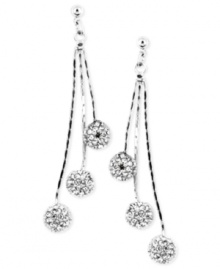 Airy and elegant, this pair of linear chandelier earrings from Anne Klein is crafted from silver-tone mixed metal. Glass crystal accents add a lustrous touch. Approximate drop 1-1/2 inches.