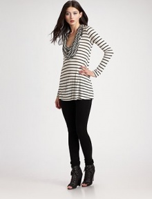 Flowy baby-doll fit with draped cowlneck and bold, horizontal stripes.> Cowlneck Long sleeves Pullover style 80% rayon/20% silk Dry clean Made in USA Flowy baby-doll fit with draped cowlneck and bold, horizontal stripes.> Cowlneck Long sleeves Pullover style 80% rayon/20% silk Dry clean Made in USA