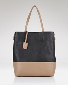Showcase your sophisticated style with classic accessories like Furla's contrast-trimmed leather tote. Sized for the day-to-day essentials, this useful carryall complements autumn's rich colors and textures. Showcase your sophisticated style with classic accessories like Furla's contrast-trimmed leather tote. Sized for the day-to-day essentials, this useful carryall complements autumn's rich colors and textures.