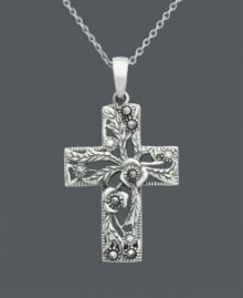 Divine style and breathtaking design. Genevieve & Grace pendant features a beautiful floral-patterned cross accented by glittering marcasite. Setting and chain crafted in sterling silver. Approximate length: 18 inches. Approximate drop length: 1-1/4 inches. Approximate drop width: 3/4 inch. Divine style and breathtaking design. Genevieve & Grace pendant features a beautiful floral-patterned cross accented by glittering marcasite. Setting and chain crafted in sterling silver. Approximate length: 18 inches. Approximate drop length: 1-1/4 inches. Approximate drop width: 3/4 inch.