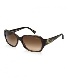 Inspired by its accessory line, this Coach collection combines multiple classic logo elements together on the temples to create a whimsical approach to the brand's heritage. A Coach Signature grommet is at the end of each temple tip. Coach gradient lenses provide 100% UV protection. Inspired by its accessory line, this Coach collection combines multiple classic logo elements together on the temples to create a whimsical approach to the brand's heritage. A Coach Signature grommet is at the end of each temple tip. Coach gradient lenses provide 100% UV protection.