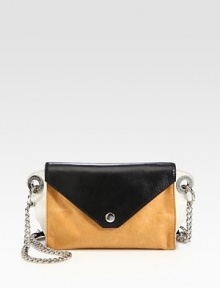 A structured flap-front silhouette crafted from gorgeous coloblocked leather.Leather and chain shoulder strap, 18 dropMagnetic flap closureOne inside open pocketCotton lining8W X 5½H X 2DImported A structured flap-front silhouette crafted from gorgeous coloblocked leather.Leather and chain shoulder strap, 18 dropMagnetic flap closureOne inside open pocketCotton lining8W X 5½H X 2DImported