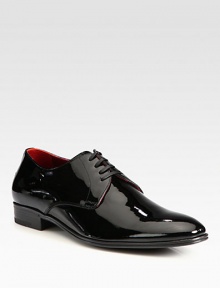 Handsomely crafted in sleek patent leather, this polished design is a formal wear essential.Patent leather upperLeather liningPadded insoleLeather sole Made in Italy