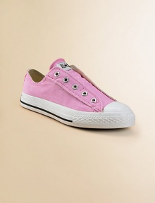An updated take on the signature design, this slip-on canvas style with no laces is easily a favorite. Rubber sole Traditional Chuck insole Cotton canvas lining ImportedFIT RECOMMENDATION: Because of generous cut, these sneakers run large. Please order 1 to 2 sizes smaller than regular shoe size. An updated take on the signature design, this slip-on canvas style with no laces is easily a favorite. Rubber sole Traditional Chuck insole Cotton canvas lining ImportedFIT RECOMMENDATION: Because of generous cut, these sneakers run large. Please order 1 to 2 sizes smaller than regular shoe size.