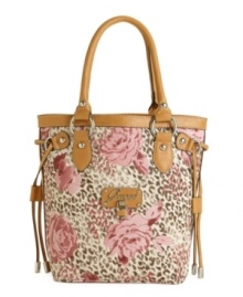 Spice up your handbag collection with this GUESS carryall that's equal parts sweet and sassy. Silvertone logo hardware, trend-right drawstring detail and a floral animal print decorate this stylish bag. Spice up your handbag collection with this GUESS carryall that's equal parts sweet and sassy. Silvertone logo hardware, trend-right drawstring detail and a floral animal print decorate this stylish bag.