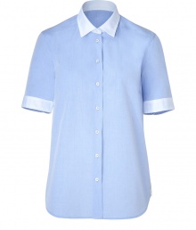 Simple, blue cotton button-down- Short sleeves and button placket- Straight, loose cut with rounded hem- White cuffs and collar add interest to the classic style - Great when paired with skinny jeans or nude shorts and flat sandals