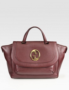 Polished signature GG hardware defines this metallic leather design. Double top handles, 4½ dropTop zip closureOne outside open pocket under flapProtective metal feetOne inside zip pocketTwo inside open pocketsLeather lining15W X 12½H X 6DMade in Italy Polished signature GG hardware defines this metallic leather design. Double top handles, 4½ dropTop zip closureOne outside open pocket under flapProtective metal feetOne inside zip pocketTwo inside open pocketsLeather lining15W X 12½H X 6DMade in Italy