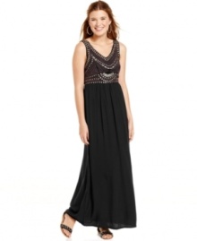 A bodice of studs and seam design wears like chic, fashionista armor on this tribal-inspired maxi dress from Angie!