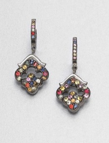 A rainbow of richly hued sapphires in an open quatrefoil-shaped design hangs from a stone-set hoop.SapphiresBlack rhodium-plated sterling silverLength, about 1PiercedImported A rainbow of richly hued sapphires in an open quatrefoil-shaped design hangs from a stone-set hoop.SapphiresBlack rhodium-plated sterling silverLength, about 1PiercedImported