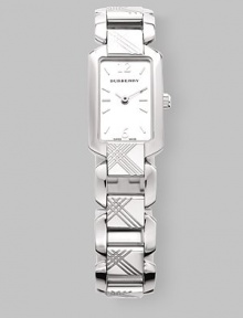 The engraved signature check accents this stylish timepiece. Stainless steel case Rectangular case, ¾W X 1H Silvertone dial Water resistant to 3 ATM Quartz movement Bracelet width, ½ Bracelet length, 7¼ Made in Switzerland