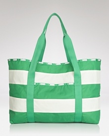 Statement stripes come about on this roomy nylon tote from LeSportsac. This easy-to-carry style is in line with adventures, whether out to sea or on land. Statement stripes come about on this roomy nylon tote from LeSportsac. This easy-to-carry style is in line with adventures, whether out to sea or on land.