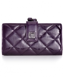 Get organized in the most elegant way with this shiny quilted clutch from Style&co. Ideally sized to slip inside a handbag, it boasts plenty of pockets and compartments for all the essentials. Get organized in the most elegant way with this shiny quilted clutch from Style&co. Ideally sized to slip inside a handbag, it boasts plenty of pockets and compartments for all the essentials.