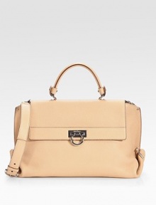 Exquisite Vitello leather, impeccably structured in a classic top handle silhouette with polished hardware and dual carrying options.Top handle, 5 dropRemovable adjustable shoulder strap, 19-22 dropFlap over zip closureOne outside zip pocketProtective metal feetOne inside zip pocketTwo inside open pocketsFully lined14W X 10H X 6½DMade in Italy Exquisite Vitello leather, impeccably structured in a classic top handle silhouette with polished hardware and dual carrying options.Top handle, 5 dropRemovable adjustable shoulder strap, 19-22 dropFlap over zip closureOne outside zip pocketProtective metal feetOne inside zip pocketTwo inside open pocketsFully lined14W X 10H X 6½DMade in Italy