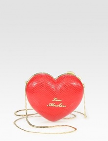 An adorable heart shaped design constructed of shiny leather, with a chic center logo and goldtone hardware. Chain shoulder strap, 21 dropTop clasp closureFully lined6¼W X 5½H X 1¼DImported An adorable heart shaped design constructed of shiny leather, with a chic center logo and goldtone hardware. Chain shoulder strap, 21 dropTop clasp closureFully lined6¼W X 5½H X 1¼DImported
