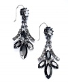 Elegance with an edge. Juicy Couture's linear drop earrings are crafted from silver tone brass with black cubic zirconia (3 ct. t.w.) to give the pair a postmodern sense of panache. Approximate drop: 2 inches.