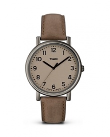 Timex's Modern Easy Reader is a straight-up classic: its perfectly round stainless steel case, blissfully uncomplicated tan dial and a goes-with-everything brown leather strap make it work ready and Saturday easy.