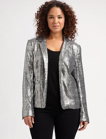 Allover sequins add stunning appeal to this fashion staple. Dress this glamorous blazer down with your dark-denim jeans.Notched collarLong sleevesFront pocketsBack princess seamsAbout 23 from shoulder to hemPolyesterDry cleanImported