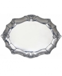 Hold court with the regal elegance of Fleur de Lis serveware and serving dishes. Lavish detail featuring the iconic French lily evokes another era, gleaming spectacularly in this magnificent oval platter from Arthur Court. Hold court with the regal elegance of Fleur de Lis serveware and serving dishes. Lavish detail featuring the iconic French lily evokes another era, gleaming spectacularly in this magnificent oval platter from Arthur Court.