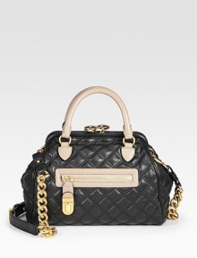A colorblocked style with a quilted leather design and a feminine frame.Double top handles, 4 dropDetachable adjustable chain and leather shoulder strap, 17½-19½ dropKiss-lock closureOne outside zip pocketOne inside zip pocketTwo inside open pocketsCotton lining11½W X 9½H X 5½DMade in Italy A colorblocked style with a quilted leather design and a feminine frame.Double top handles, 4 dropDetachable adjustable chain and leather shoulder strap, 17½-19½ dropKiss-lock closureOne outside zip pocketOne inside zip pocketTwo inside open pocketsCotton lining11½W X 9½H X 5½DMade in Italy