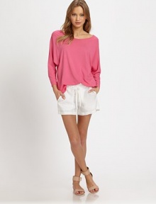 Alarmingly soft, draped boatneck with long dolman sleeves and a lengthy silhouette that works wonders with skinny jeans or leggings. BoatneckDropped shouldersLong dolman sleevesLonger length hits below the hips50% viscose/50% modalDry cleanImportedModel shown is 5'10 (177cm) wearing US size Small.