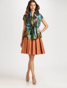The ultimate skirt with a flattering flared silhouette and a sleek fabrication with a glamorous sheen.Feminine, flared designBack zipperAbout 22 long56% nylon/44% cottonDry cleanMade in USA of imported fabric Model shown is 5'11½ (181cm) wearing US size 4. The ultimate skirt with a flattering flared silhouette and a sleek fabrication with a glamorous sheen.Feminine, flared designBack zipperAbout 22 long56% nylon/44% cottonDry cleanMade in USA of imported fabric Model shown is 5'11½ (181cm) wearing US size 4.