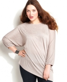 Shimmer from day to night with INC's three-quarter sleeve plus size top, accented by a rhinestone finish. Shimmer from day to night with INC's three-quarter sleeve plus size top, accented by a rhinestone finish.