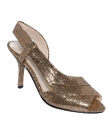 Shine the night away with Carla's evening sandals. A shimmering glitter upper provides the perfect starting point for a truly magical night.