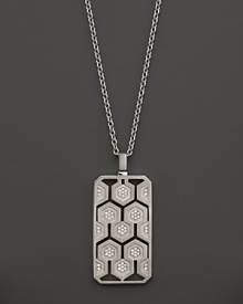 An eye-catching geometric pattern and brilliant diamonds captivate in this sterling silver dog tag necklace from India Hicks.