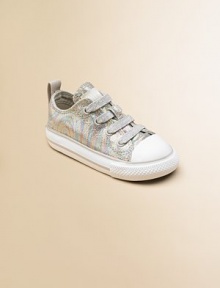This tiny version of the signature classic is given an update in shiny, rainbow swirls.Lace-upCotton upperTextile liningRubber soleTraditional Chuck insoleImported This tiny version of the signature classic is given an update in shiny, rainbow swirls.Lace-upCotton upperTextile liningRubber soleTraditional Chuck insoleImported