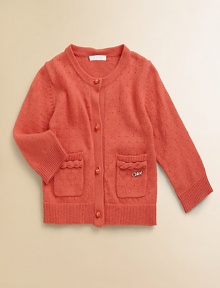 A classic knit with signature Chloe style, made from a luxurious combination of cotton and cashmere. Round neckLong sleevesButton frontCable-knit-trimLogo detail on pocketRibbed trim85% cotton/15% cashmereDry cleanImported A classic knit with signature Chloe style, made from a luxurious combination of cotton and cashmere. Round neckLong sleevesButton frontCable-knit-trimLogo detail on pocketRibbed trim85% cotton/15% cashmereDry cleanImported