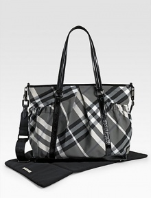 With the look of a classic tote, this check bag holds everything your baby needs in sophisticated Burberry style. Double handles, 10 drop Adjustable, detachable shoulder strap, 22 drop Top zip closure Outside open pouches Inside zip and open pockets Removable changing mat 17W X 13H X 6D PVC Imported With the look of a classic tote, this check bag holds everything your baby needs in sophisticated Burberry style. Double handles, 10 drop Adjustable, detachable shoulder strap, 22 drop Top zip closure Outside open pouches Inside zip and open pockets Removable changing mat 17W X 13H X 6D PVC Imported
