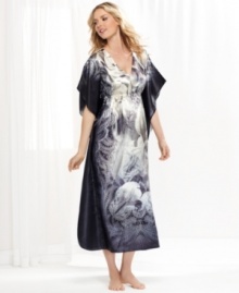 One World's Maxi caftan is loose, flowy, and fancy. With an elegant lace print and an easy v-neck, this floor-length style is nothing but comfortable. One World's Maxi caftan is loose, flowy, and fancy. With an elegant lace print and an easy v-neck, this floor-length style is nothing but comfortable.