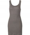 Stylish tank top in black ribbed cotton - Super-soft, machine washable material - Flattering wide scoop neckline - Extra-long, ultra-fitted silhouette - Hits mid-thigh - A genius basic ideal for layering beneath blazers and cardigans - Pair with denim or leather slim pants and style with scarves or colorful multi-strand necklaces