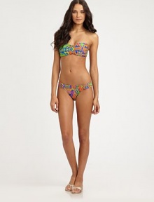 Vibrantly designed and featuring unique, twisted sides for a gorgeous effect. Stretch comfortLoop sidesFully lined80% nylon/20% Lycra®Hand washMade in USA of Italian fabric Please note: Bikini top sold separately. Vibrantly designed and featuring unique, twisted sides for a gorgeous effect. Stretch comfortLoop sidesFully lined80% nylon/20% Lycra®Hand washMade in USA of Italian fabric Please note: Bikini top sold separately.