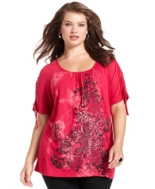 Team your denim with Style&co.'s short sleeve plus size top, showcasing an embellished print!