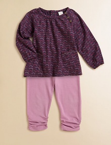 The season's must-have peasant top features front button detail, front patch pockets and a colorful zig-zag print with matching leggings.Round necklineLong sleeves with elastic cuffsBack snapsPatch pockets Leggings Elastic waistbandRuched hemCottonMachine washImported Please note: Number of snaps may vary depending on size ordered. The season's must-have peasant top features front button detail, front patch pockets and a colorful zig-zag print with matching leggings.Round necklineLong sleeves with elastic cuffsBack snapsPatch pockets Leggings Elastic waistbandRuched hemCottonMachine washImported Please note: Number of snaps may vary depending on size ordered.