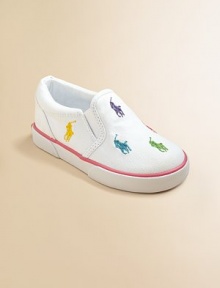 Smart, sturdy cotton canvas slip-ons, sprinkled with bright polo ponies, mix and match her summer play clothes.Cotton canvas upperElasticized side goresPlush terry liningRubber soleImported