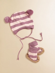 This adorably striped set offers a bold, fun take on two baby basics. Hat Braided tie closurePom-pom ears Booties Pull-on style with knit cuffsBottom tractionCottonMachine washImported