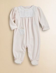 A beautiful long-sleeved footed coverall in plush velour is highlighted with a pretty pintucked bib.CrewneckLong puff sleevesBack buttonsFront patch pocketBottom snapsCottonMachine washImported Please note: Number of buttons/snaps may vary depending on size ordered. 