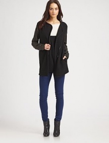 Designed with long leather sleeves, slash pockets and an asymmetrical zipper, this modern biker jacket hits below the hips. Asymmetrical zipperSlash pocketsLong leather sleevesAbout 29 from shoulder to hemBody: wool; trim: leatherDry clean with leather specialistMade in USA of imported fabricModel shown is 5'10 (177cm) wearing US size Small.