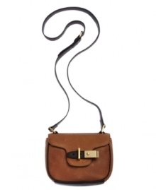 Elegance is all about the details and this Calvin Klein crossbody has it in spades. From the polished gold-tone hardware to the delicate accent stitching, this silhouette is a season essential. Elegance is all about the details and this Calvin Klein crossbody has it in spades. From the polished gold-tone hardware to the delicate accent stitching, this silhouette is a season essential.