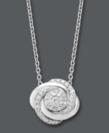 Swirls of pave-set diamonds add magic to any look. Wrapped in Love(tm) pendant features swirls of round-cut diamonds (1/4 ct. t.w.) set in sterling silver. Approximate length: 18 inches. Approximate drop: 3/4 inch.