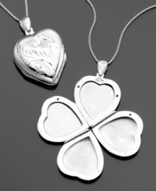 This enchanting, engraved sterling silver locket has a secret: it opens like a lucky clover to hold four different photos. Approximate length: 18 inches. This enchanting, engraved sterling silver locket has a secret: it opens like a lucky clover to hold four different photos. Approximate length: 18 inches.