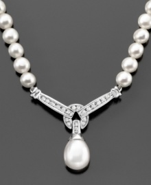 Elegant pearls (9mm) are heightened in beauty with the addition of sparkling round-cut diamonds (1/3 ct. t.w.) in this breathtaking necklace. Approximate length: 17 inches. Approximate drop: 1-1/4 inches. Elegant pearls (9mm) are heightened in beauty with the addition of sparkling round-cut diamonds (1/3 ct. t.w.) in this breathtaking necklace. Approximate length: 17 inches. Approximate drop: 1-1/4 inches.