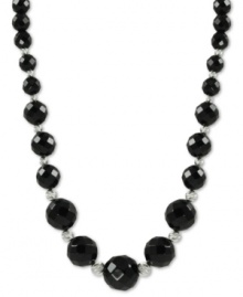 Beautiful in black. Rich onyx (6-12 mm) stands out on this sterling silver necklace with rhodium-plated sparkle beads adding a lustrous touch. Approximate length: 18 inches. Beautiful in black. Rich onyx (6-12 mm) stands out on this sterling silver necklace with rhodium-plated sparkle beads adding a lustrous touch. Approximate length: 18 inches.