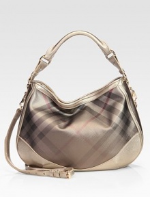 Coated check canvas takes on a soft, slouchy silhouette, trimmed with rich metallic leather.Top handle, 5 dropAdjustable removable shoulder strap, 22-25 dropTop zip closureOne inside zip pocketTwo inside open pocketsNylon lining14½W X 11H X 2½DMade in Italy