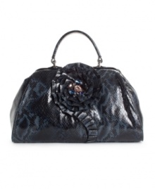A flirty ruffled rose turns the classic doctor bag into a glamorously fun bag, by Jessica Simpson. A flirty ruffled rose turns the classic doctor bag into a glamorously fun bag, by Jessica Simpson.