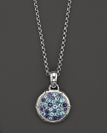 Sterling silver, jointed like a bamboo stalk, circles a glittering pavé lagoon of Swiss blue topaz and iolite gems on a pendant suspended from a delicate adjustable chain. Sterling silver, jointed like a bamboo stalk, circles a glittering pavé lagoon of Swiss blue topaz and iolite gems on a pendant suspended from a delicate adjustable chain.